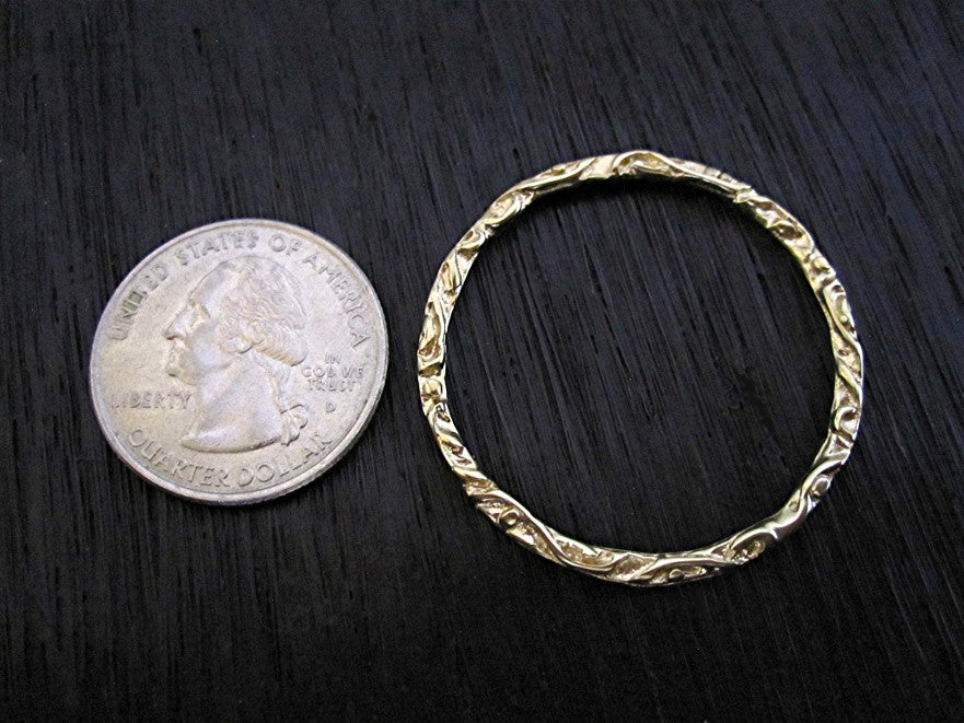 VDI Jewelry Findings Large Gold Bronze Jewelry Link and Connector Next to a Quarter