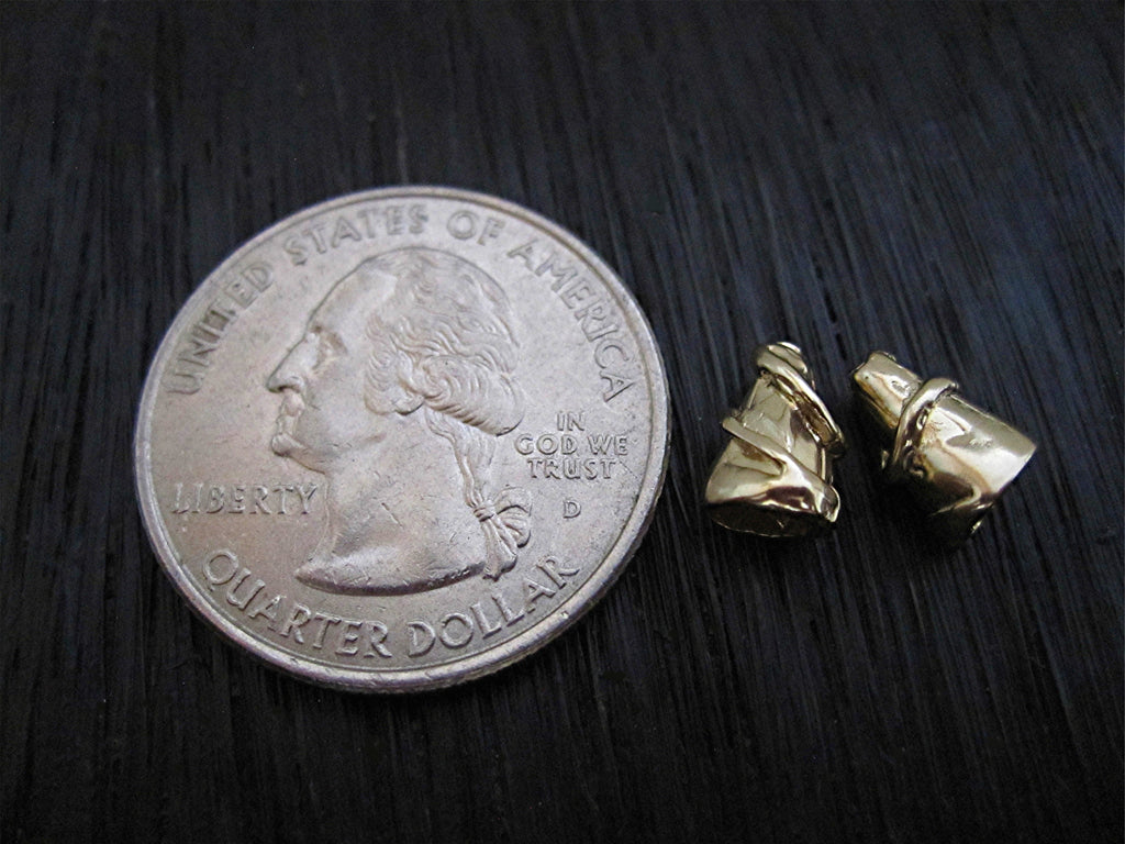 VDI Jewelry Findings Small Gold Bronze Textured Jewelry Cones Next to a Quarter