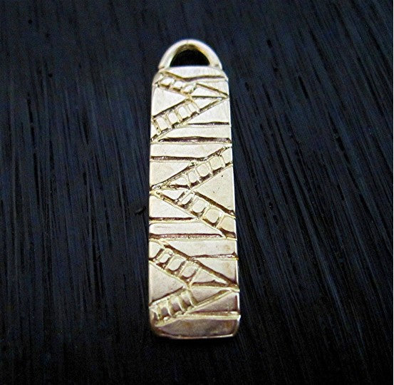 One Gold Bronze Southwest Style Pendant