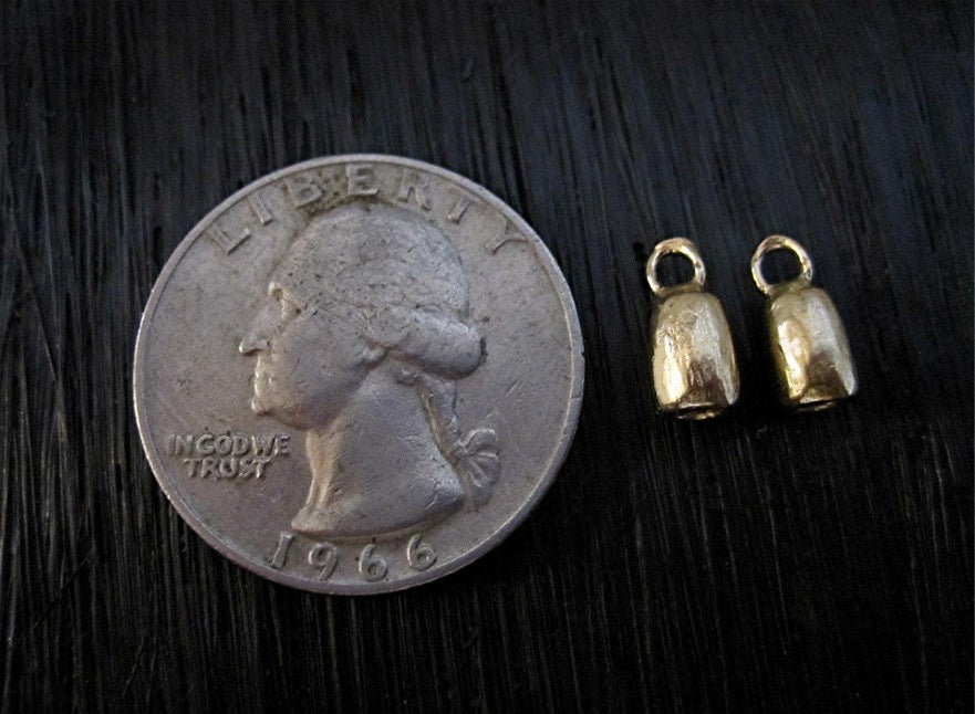 VDI Jewelry Findings Small Smooth Gold Bronze 2mm Clasp End Caps Next to a Quarter