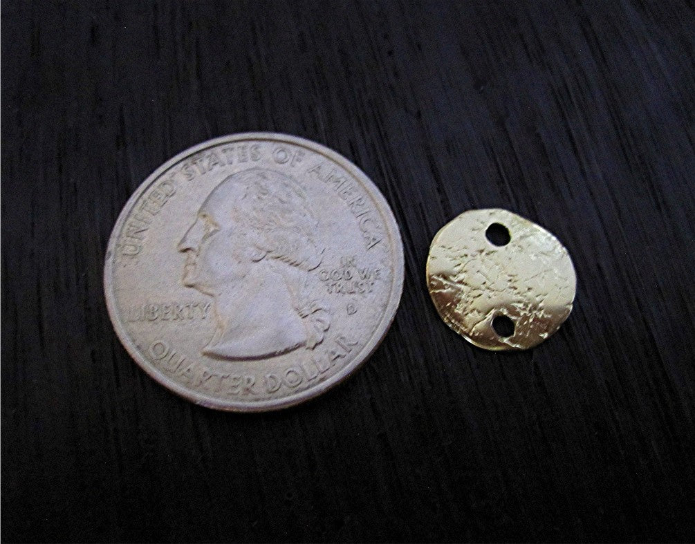 VDI Jewelry Findings Small Textured Gold Bronze Disc Link and Connector Next to a Quarter