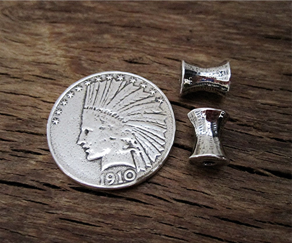 Sterling Silver Smooth Concave bead Next to a Quarter