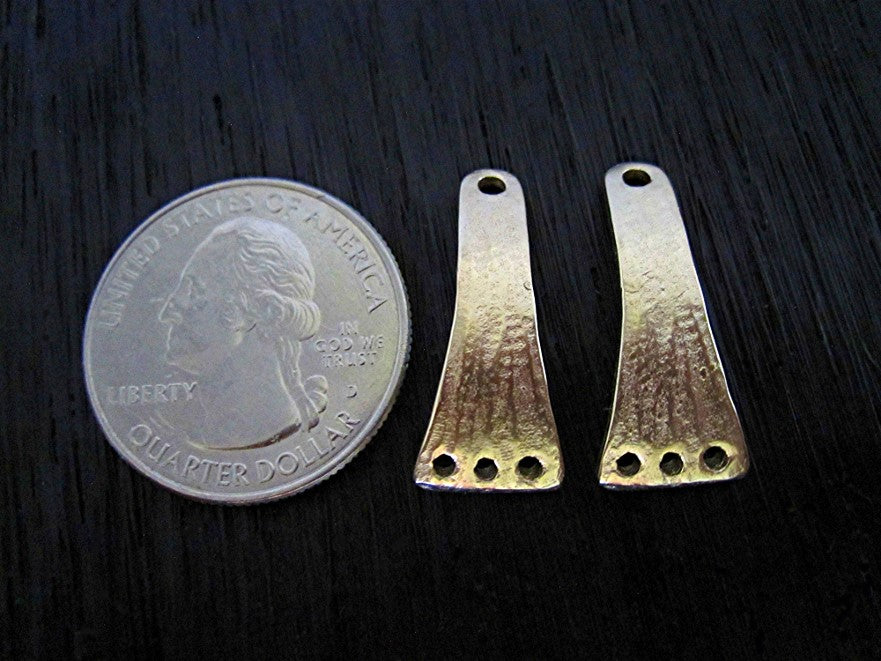 VDI Jewelry Findings Gold Bronze Artisan Earring Dangles next to a quarter for size